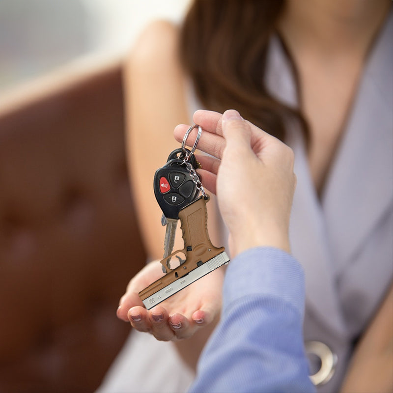 New Empire 1:3 Glock G17 alloy keychain, realistic gun model with detachable soldier gear & bullets.