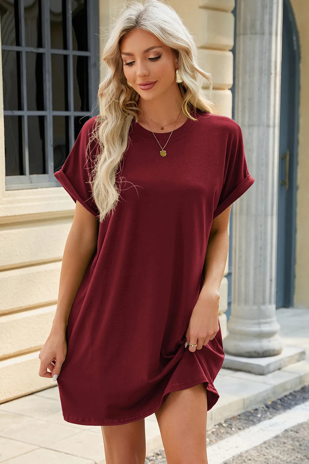 Solid color round neck pocket loose short sleeved dress