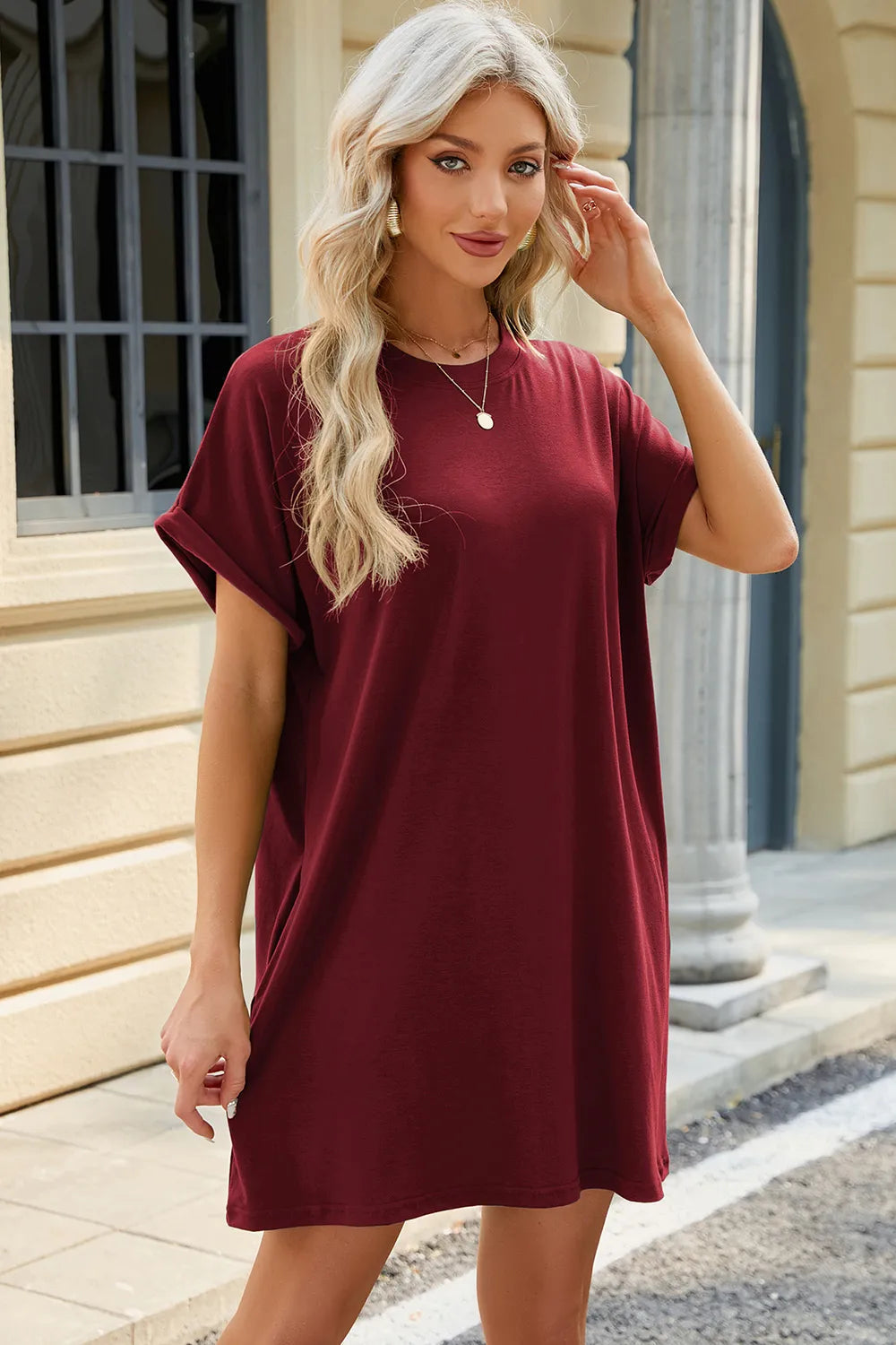 Solid color round neck pocket loose short sleeved dress