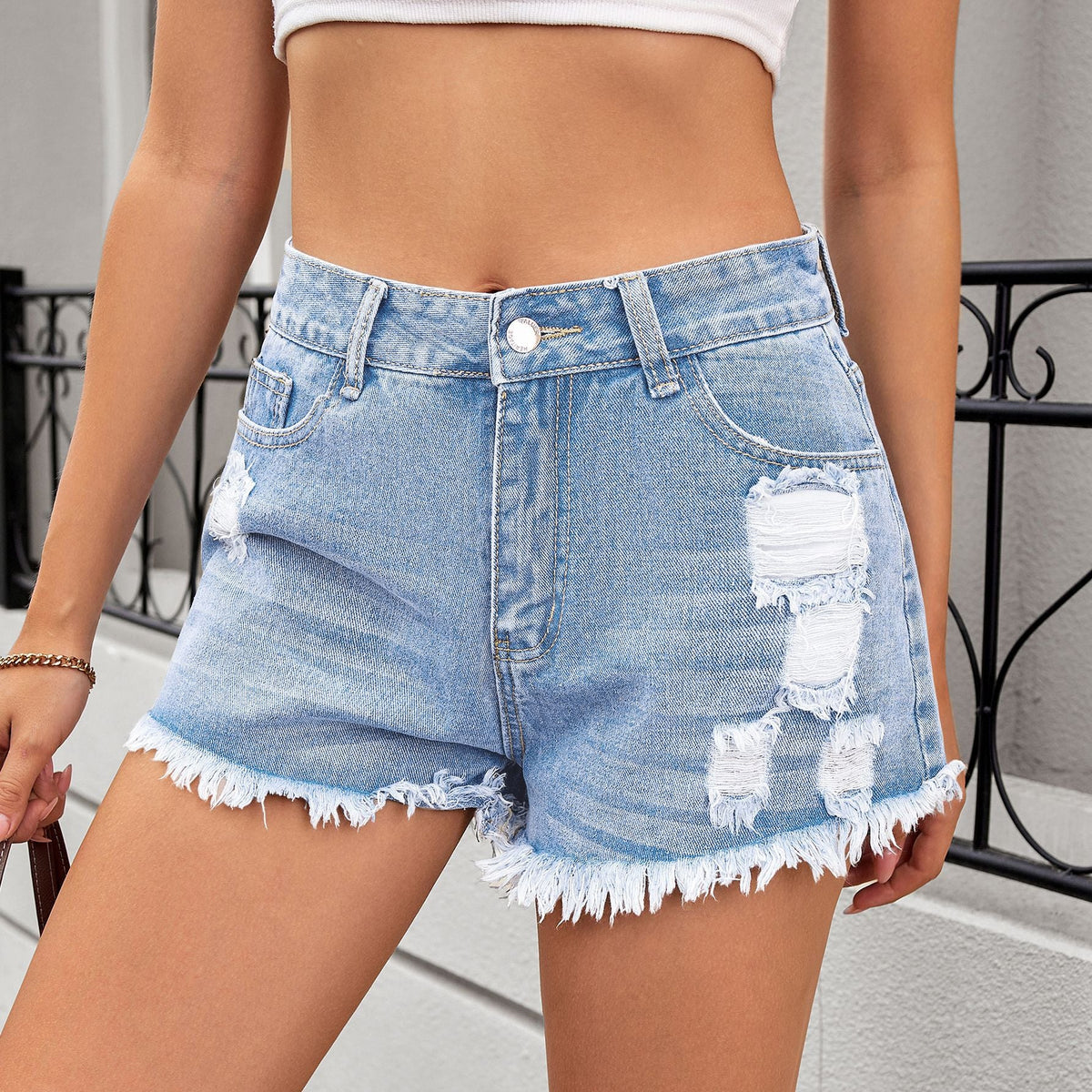 Women's ripped denim shorts and hot pants